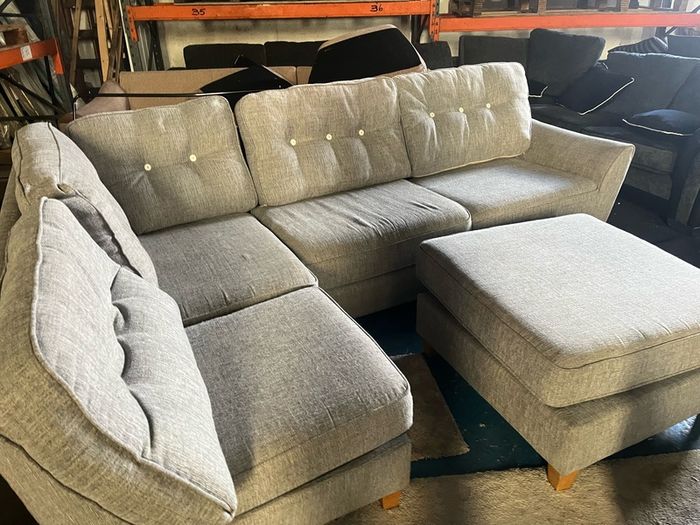 Grey corner sofa with matching footstool