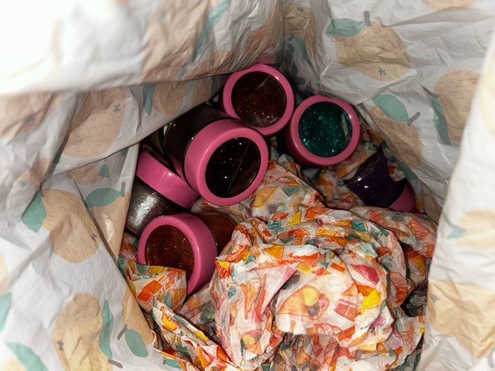Bag of tubs of glitter