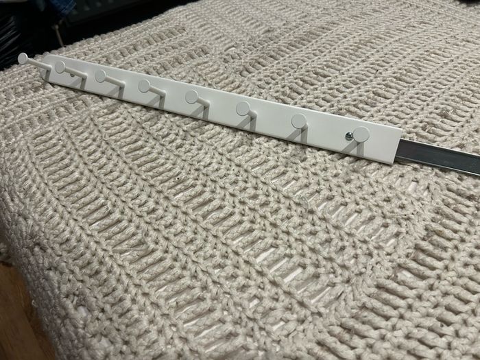 Sliding wardrobe hooks