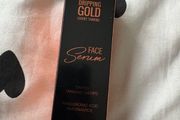Dripping gold face serum - tinted tanning drops
