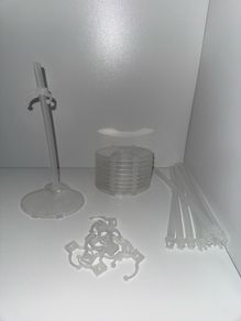 10 doll stand transparent