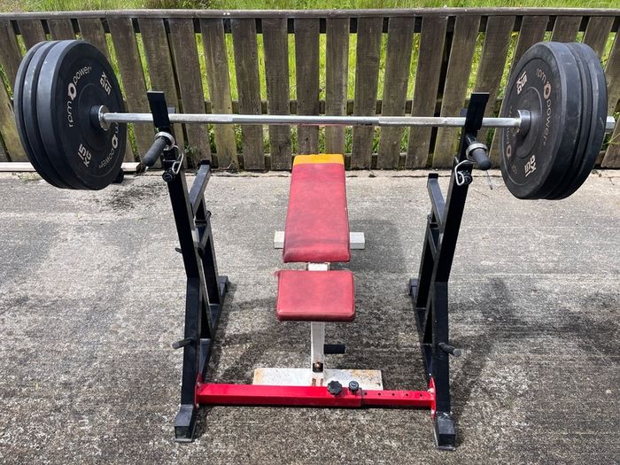 Gym equipment (squat rack/ bench / barbell + weights)