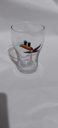 guinness glass with toucan,see pictures for condition good,,