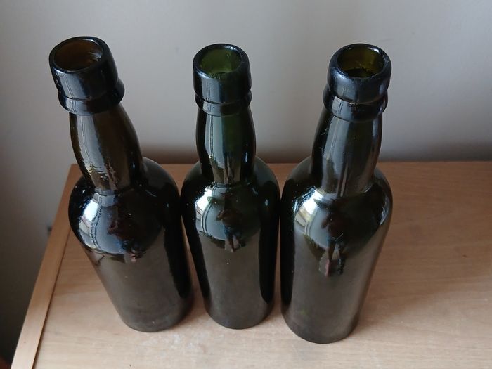 Lot of 3 vintage Guinness bottles