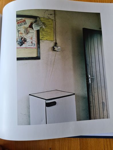 Under A GREY Sky. By Simon Burch. This Book Of Photos  Follows The landscape,people, & Towns Affected By The Collaps Of Board Na Mona's Peat Mining  Industry. IN IRELAND.