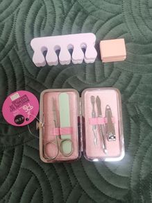 Manicure set, pedicure items, body roller and scrub.