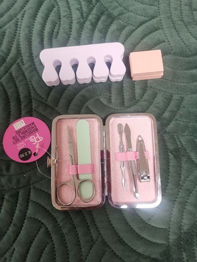 Manicure set, pedicure items, body roller and scrub.