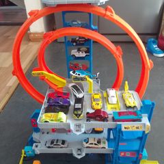 120 toy cars and hot wheel garage