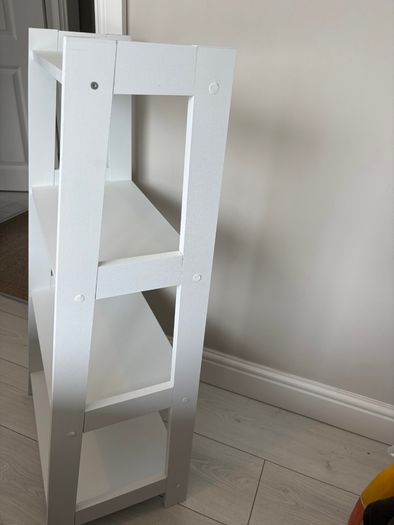 White ladder storage unit