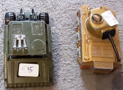 two vintage army vehicles