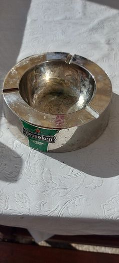 Heineken metal ashtray ,used condition, still nice condition ,buyer collects or pays postage thank you, sold as is,