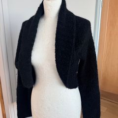 Louise Kennedy shrug