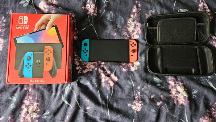 Nintendo Switch OLED + Portable Carry Case