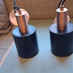 Pendant ceiling lights copper and black.