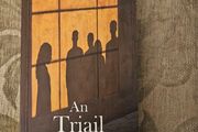 An Triail. By Mairead Ni Ghrada.  Paperback In Good Condition. See Photos For Same.