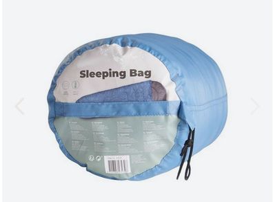 New Blue Sleeping bag in a down-string bag - great for sleepovers, festivals and camping trips