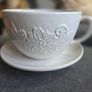 plant pot in the shape of a cup and saucer. Image 4
