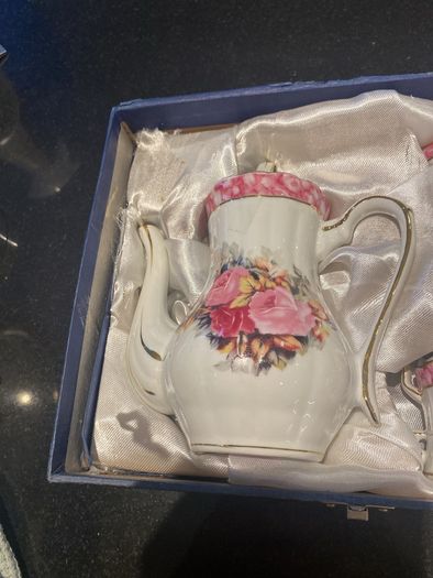 Vintage Porcelain small teapot sugar bowl and creamer set .       porcelain