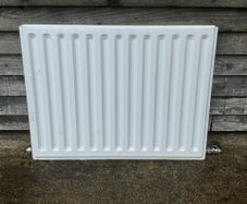 Radiators   one standard radiator   one towel radiator