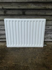 Radiators, one standard radiator, one towel radiator
