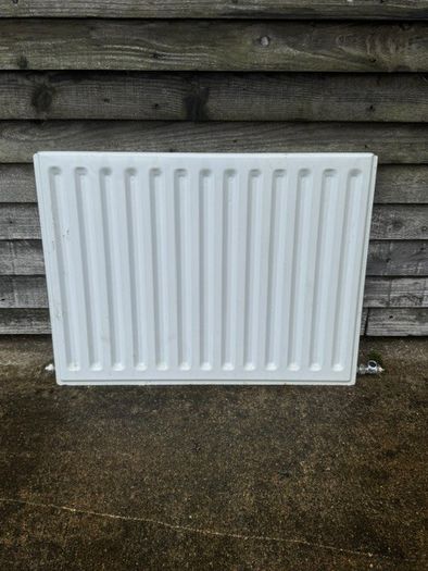 Radiators, one standard radiator, one towel radiator