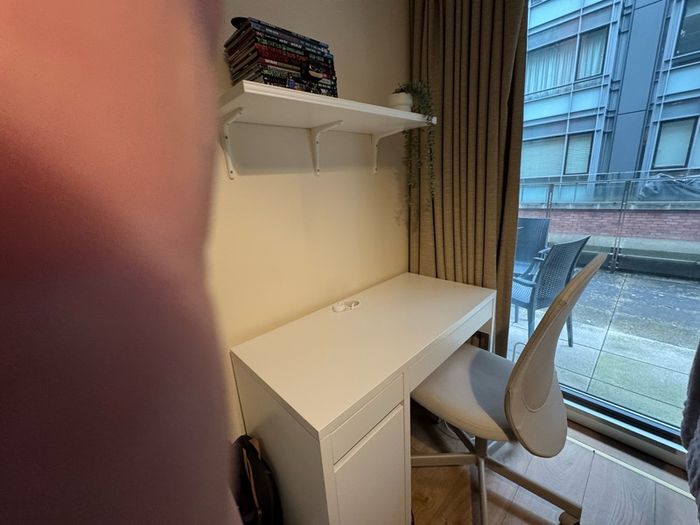 Studying table, two bedside table, office chair and a wall shelf