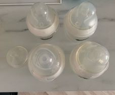 Feeding bottles and manual pump
