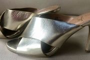 Gold high heel shoes