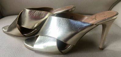 Gold high heel shoes