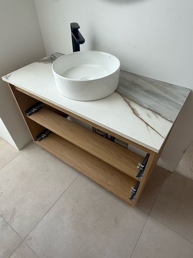 Stone countertops backsplashs window cills.