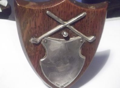 a small antique silver  golf plaque