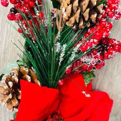 Collection of artificial red poinsettia and berry