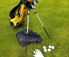 Bag with selection of kids golf clubs