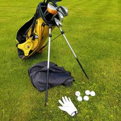 Bag with selection of kids golf clubs