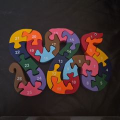 Wooden snake letter/number jigsaw in wooden case