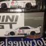 Mini GT 1:64 scale diecast model of the Nissan LB-ER34 Super Silhouette Athlet/Collet car. Liberty Walk's Nissan Skyline GT-R Blister Pack Image 4
