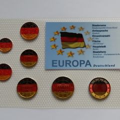 Colorized German euro coins set national tricolour flag