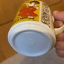 vintage ceramic mug from the Monopoli Brand featuring cabaret poster illustration Image 4