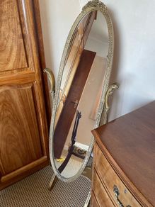 Late 19th-century oval cheval free-standing dressing mirror.