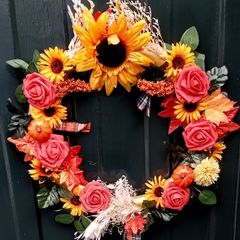 Autumnal door wreath with sunflowers and roses