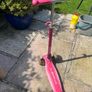 3 wheel children's light up scooter, one handle bar grip missing. Image 2