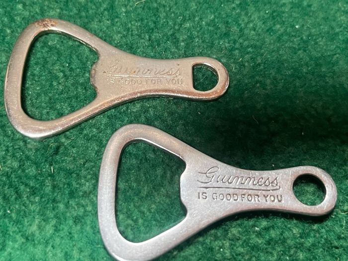 pair of vintage Guinness Bottle Openers