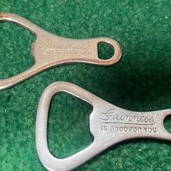 pair of vintage Guinness Bottle Openers