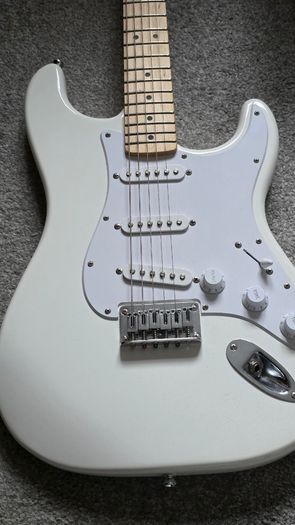 Squier Stratocaster electric guitar and Marshall MG15 amplifier