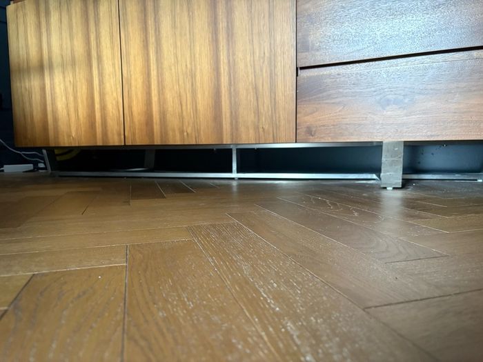 Modern walnut sideboard with stone top