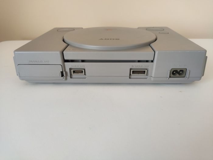 Playstation 1 console SCPH-7502 with games and cords