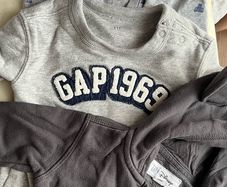 1 full bag of baby boy clothes from 0-3,3-6,6-9months with lots of FREEBIES (Nuby tub , play gym and water mat and baby cushion)