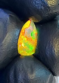 Ethiopian opal 1.75 ct faceted gemstone
