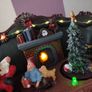 Christmas Village Light Up Santa on Chair Image 2