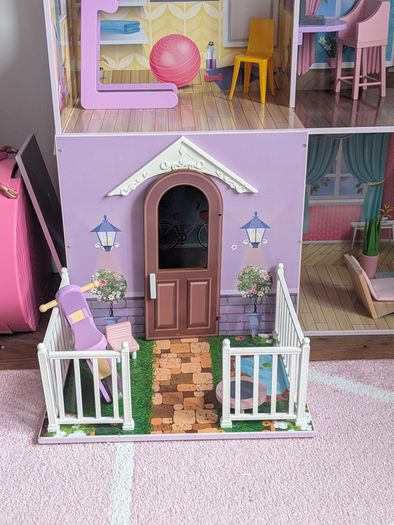 Large wooden dolls house with furniture